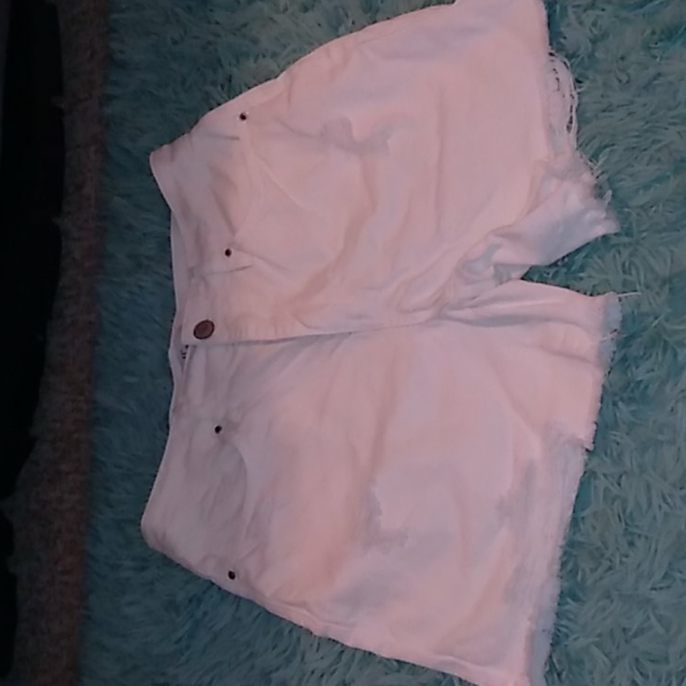 White cut up shorts